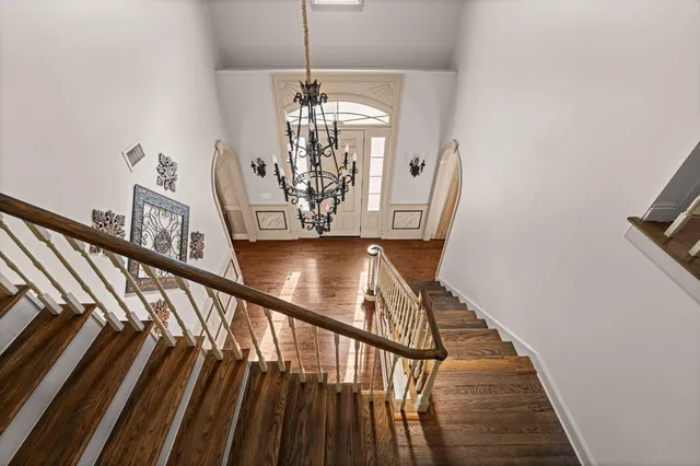 a bedroom with a bed and a fireplace