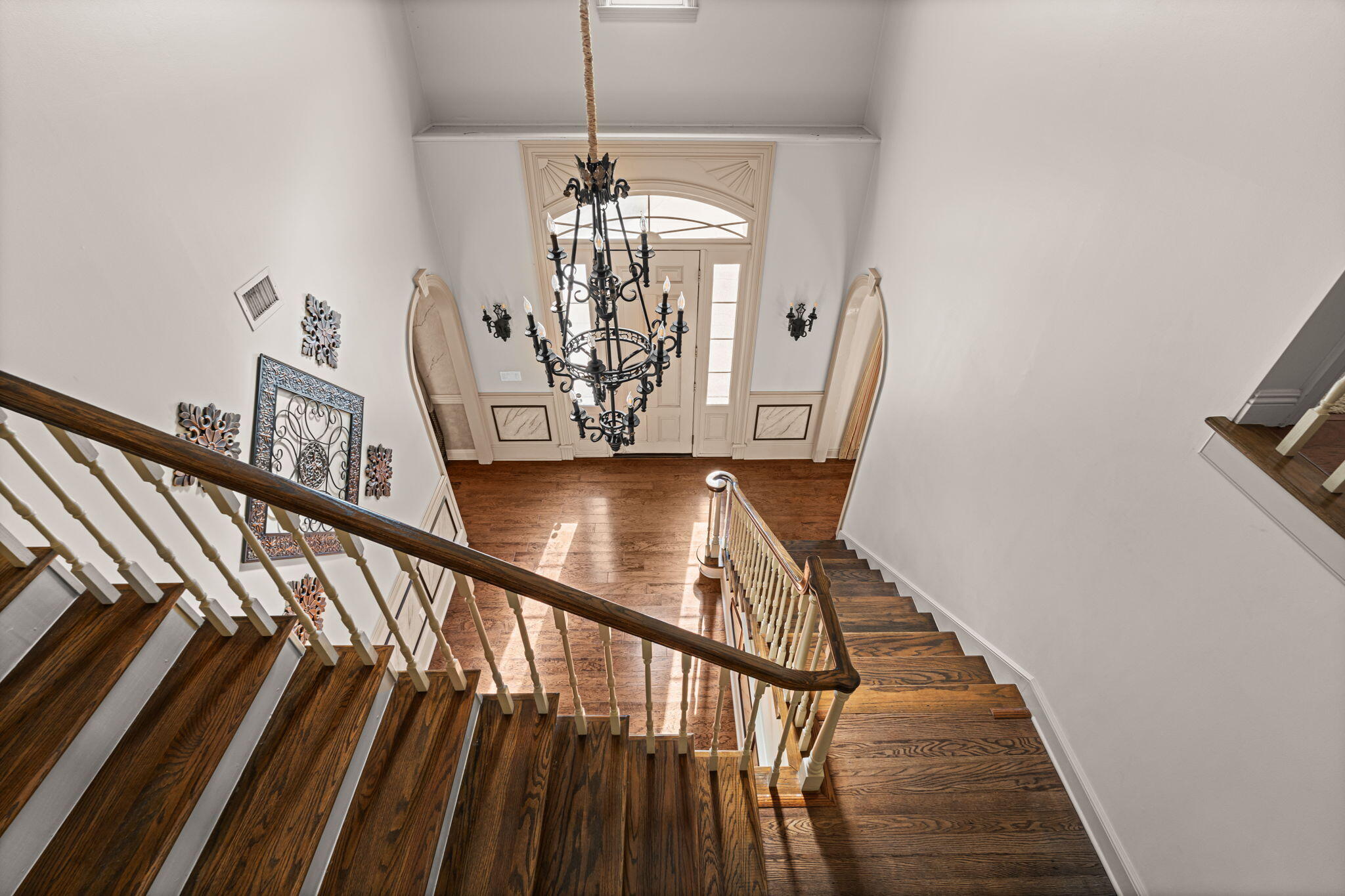 322 Wahoo Road Panama City Beach, FL 32408 - Photo 42 of 57 a view of a room with wooden floor and staircase