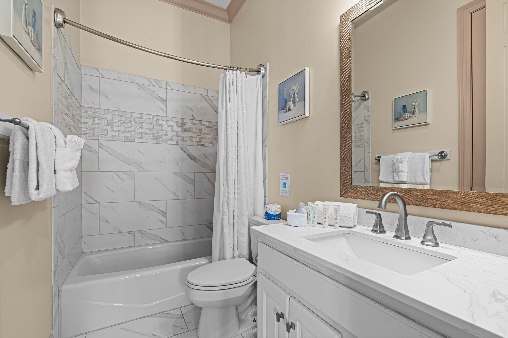 322 Wahoo Road Panama City Beach, FL 32408 - Photo 45 of 57 a bathroom with a sink a toilet and shower