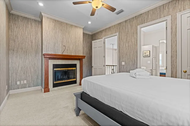 a room with furniture pool table and windows