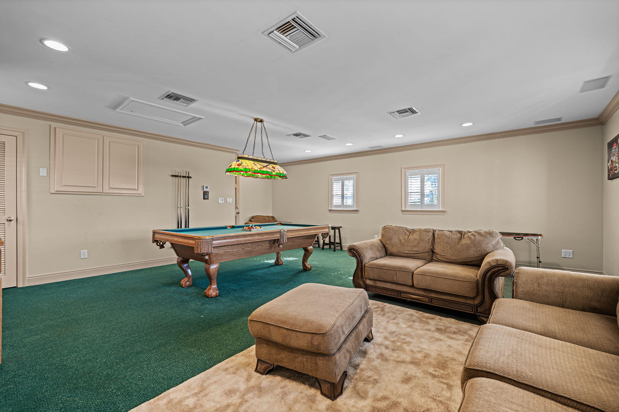 322 Wahoo Road Panama City Beach, FL 32408 - Photo 56 of 57 a living room with furniture a rug and a window