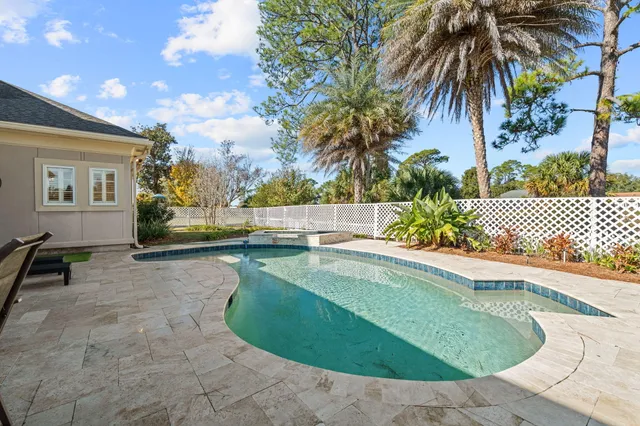a view of a house with swimming pool