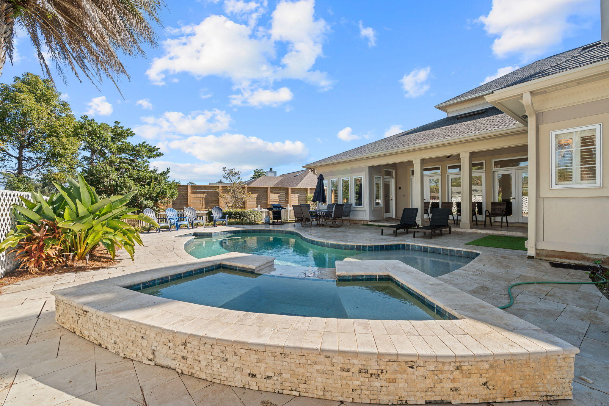 322 Wahoo Road Panama City Beach, FL 32408 - Photo 8 of 57 a view of a house with swimming pool