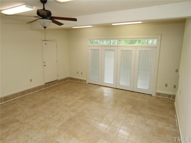 809 Carpenter Fletcher Road Durham, NC 27713 - Photo 6 of 14 The multi-functional great room has a tile floor and can serve as a bonus room, media center or workout room. Den/Family/Great Room