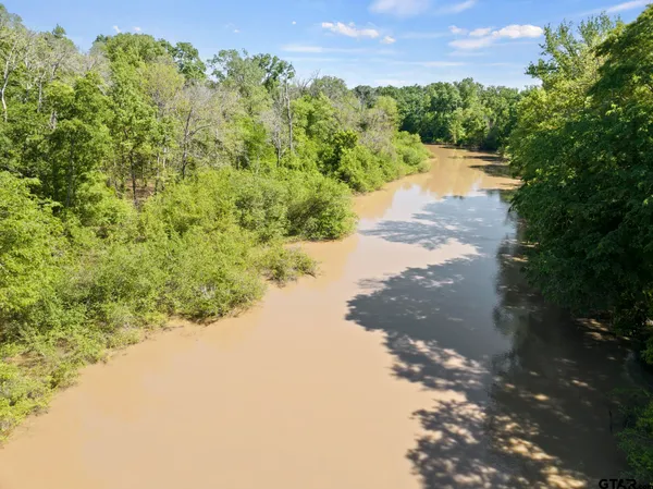 a view of a lake with a mountain in the background