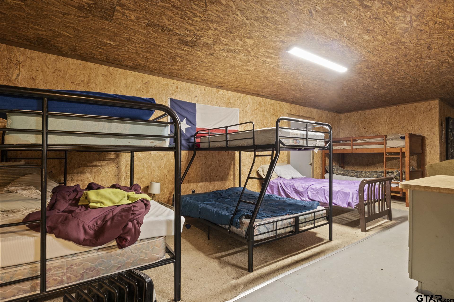 307 Fish Trap Lane Naples, TX 75568 - Photo 9 of 41 a view of a room with gym equipment