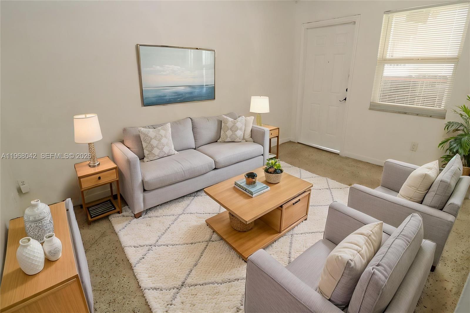 951 Southwest 7th Street, Unit 5 Miami, FL 33130 - Photo 2 of 23 a living room with furniture and a window