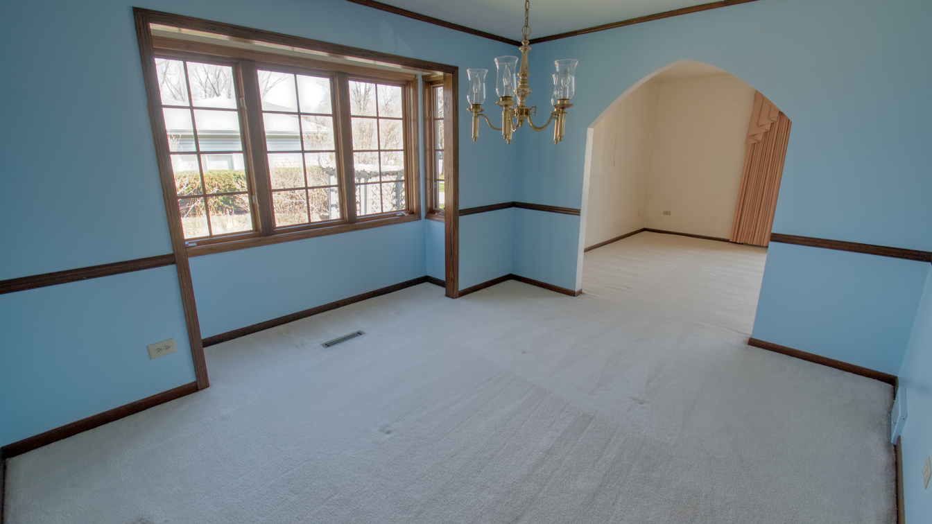 1200 Ridgeway Drive Elgin, IL 60123 - Photo 12 of 34 an empty room with windows