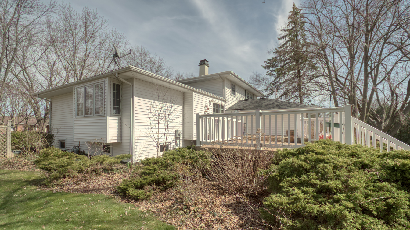 1200 Ridgeway Drive Elgin, IL 60123 - Photo 30 of 34 a front view of a house with garden