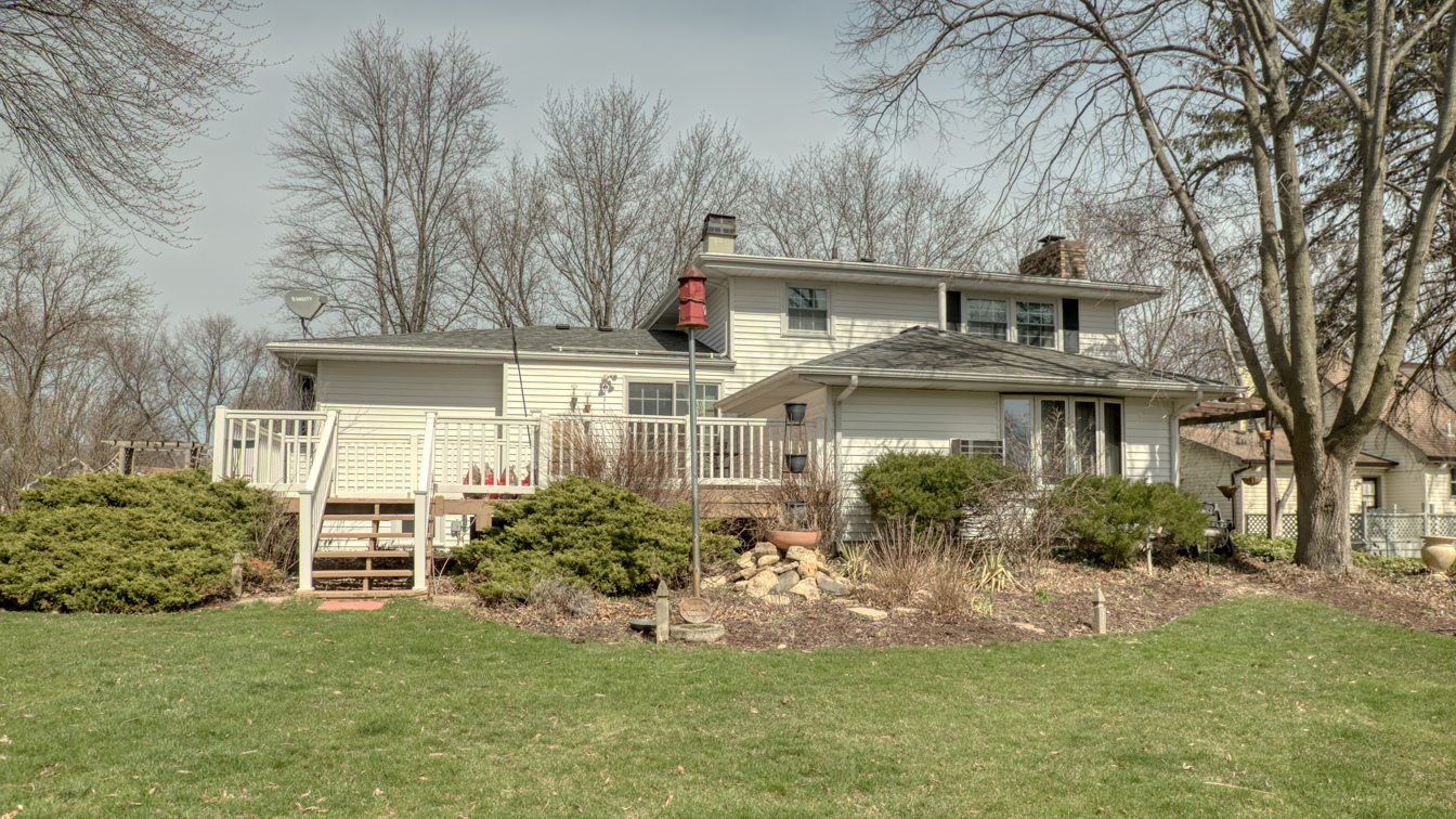 1200 Ridgeway Drive Elgin, IL 60123 - Photo 5 of 34 front view of a house with a yard