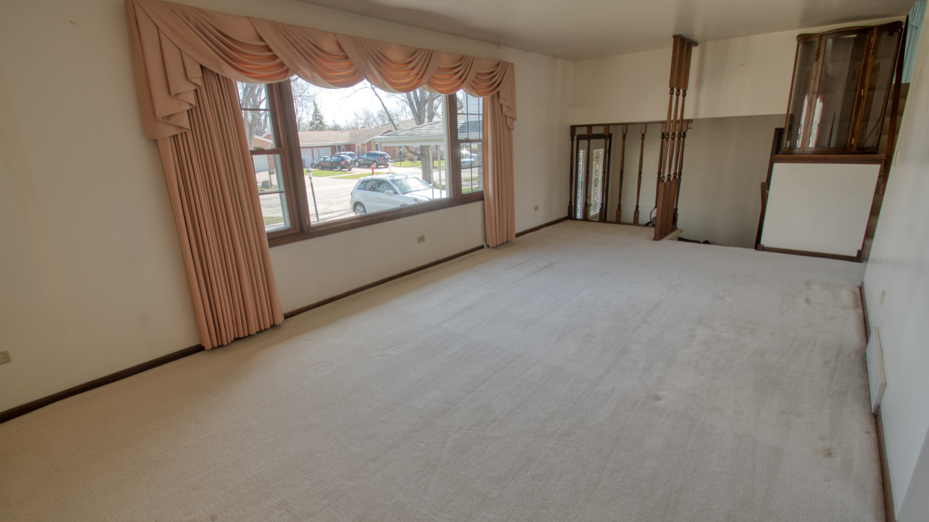 1200 Ridgeway Drive Elgin, IL 60123 - Photo 9 of 34 a view of empty room with front door