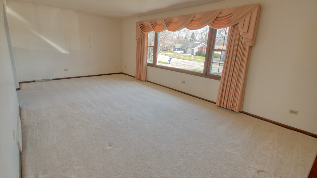 1200 Ridgeway Drive Elgin, IL 60123 - Photo 10 of 34 an empty room with windows