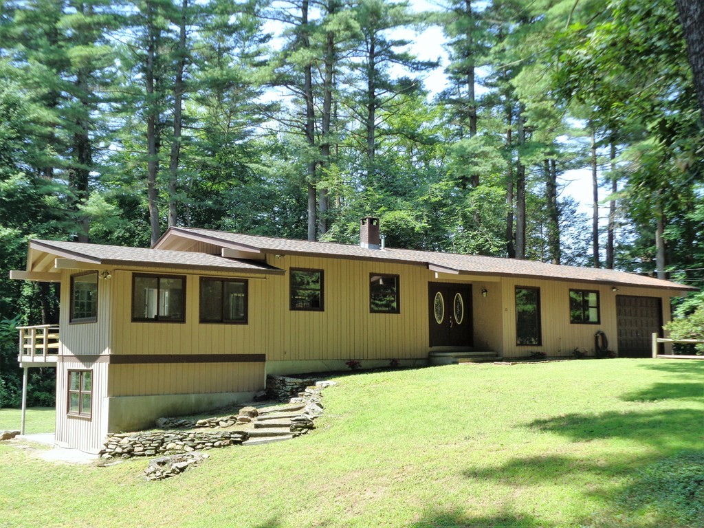 10 River Road Sturbridge, MA 01566 - Photo 1 of 29 a front view of a house with a yard