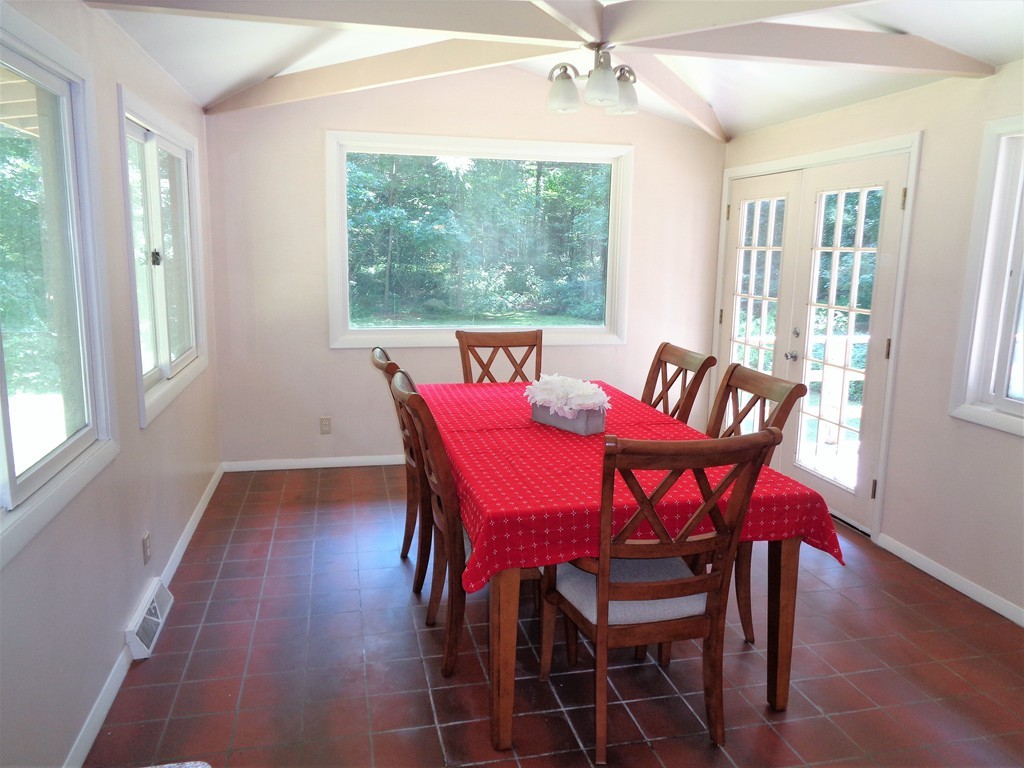 10 River Road Sturbridge, MA 01566 - Photo 11 of 29 a view of a dining room with furniture window and wooden floor