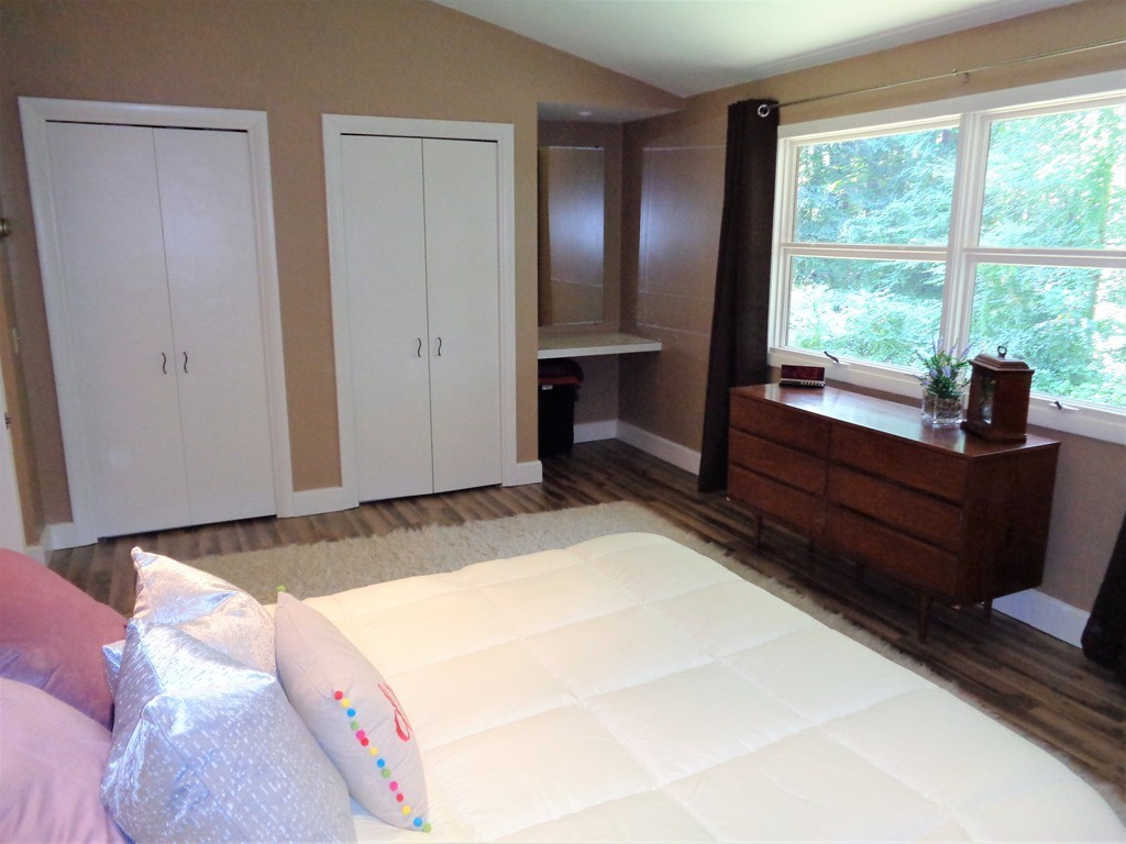 10 River Road Sturbridge, MA 01566 - Photo 13 of 29 a bedroom with a bed and a window