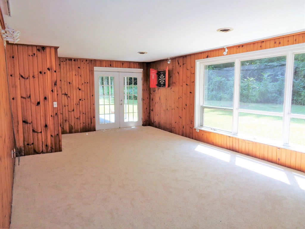 10 River Road Sturbridge, MA 01566 - Photo 18 of 29 a view of an empty room with a window