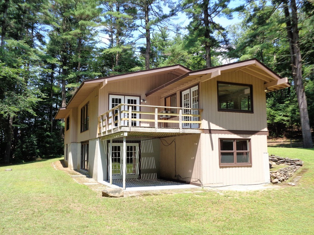 10 River Road Sturbridge, MA 01566 - Photo 28 of 29 a front view of a house with a garden