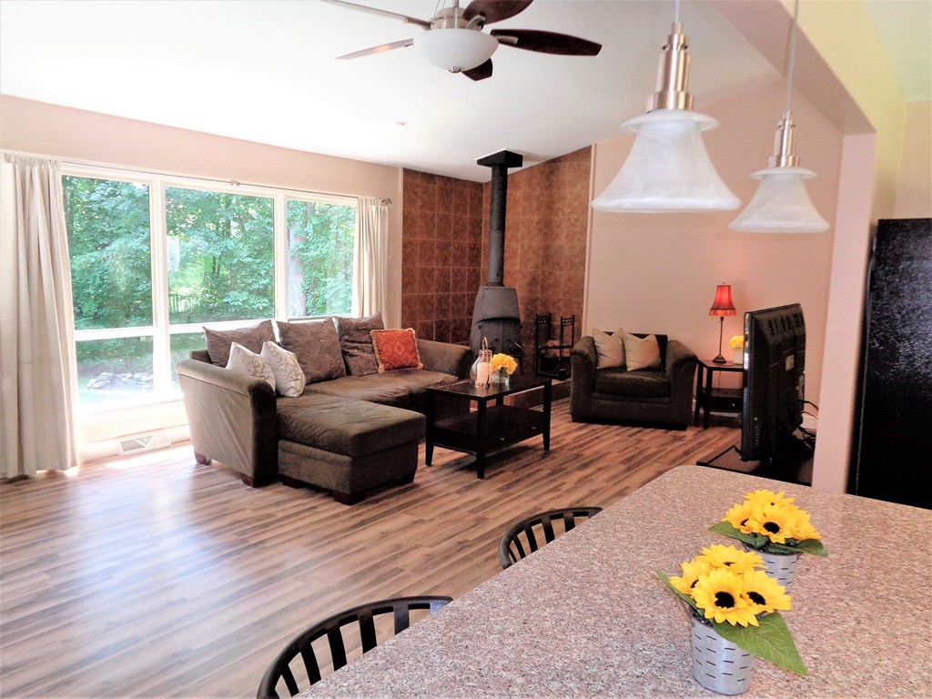 10 River Road Sturbridge, MA 01566 - Photo 6 of 29 a living room with furniture and a table