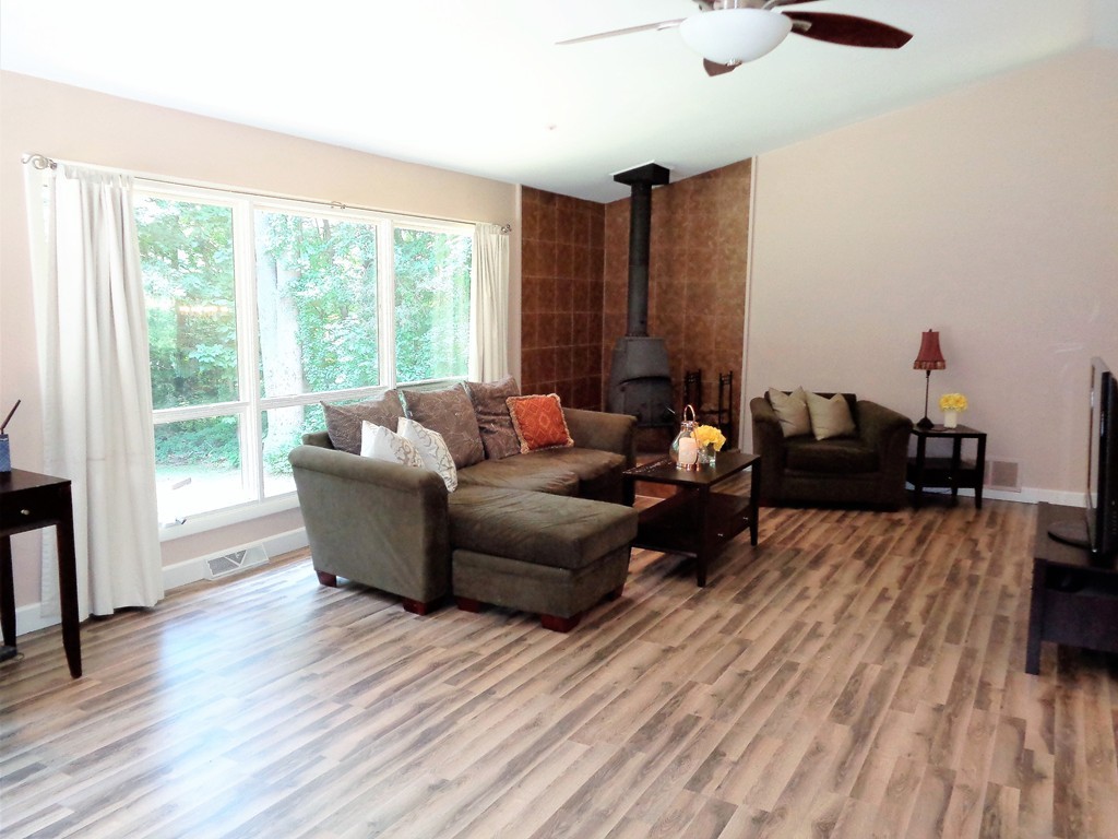 10 River Road Sturbridge, MA 01566 - Photo 7 of 29 a living room with furniture and a large window