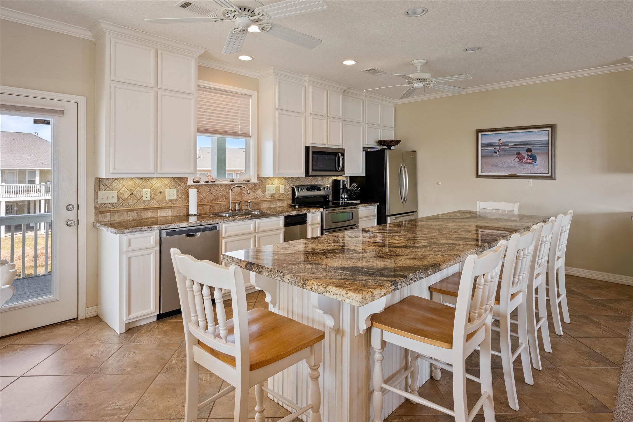 3125 James Street Crystal Beach, TX 77650 - Photo 14 of 45 a view of a dining room with furniture