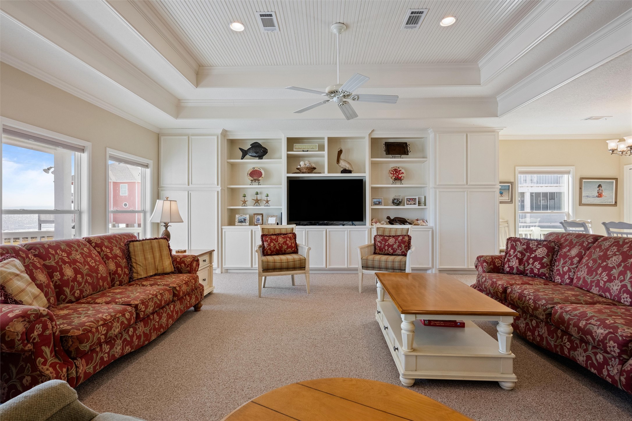 3125 James Street Crystal Beach, TX 77650 - Photo 23 of 45 a living room with furniture workspace and a flat screen tv