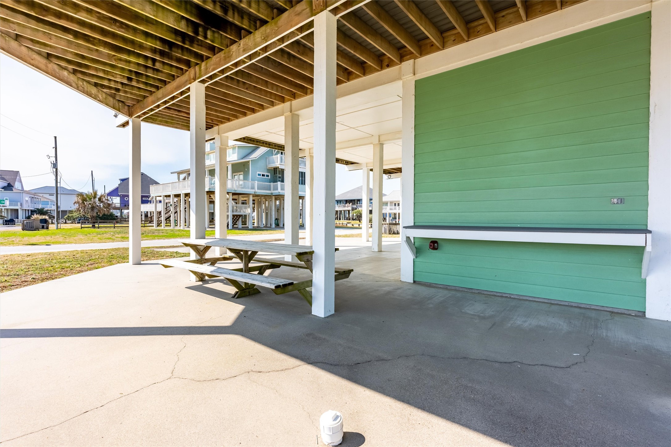 3125 James Street Crystal Beach, TX 77650 - Photo 42 of 45 a view of a swimming pool with a patio and a yard