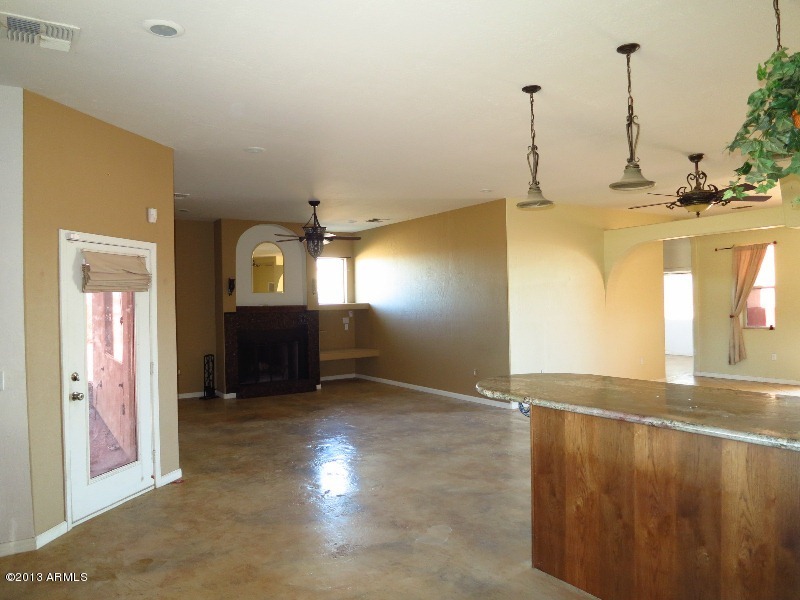 12234 North Table Top Road Maricopa, AZ 85139 - Photo 15 of 50 Kitchen- view to family room