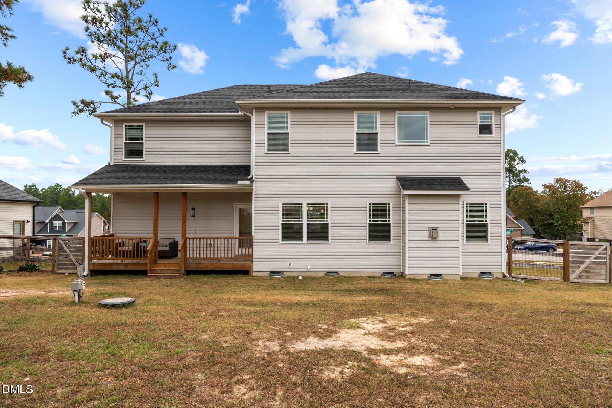 111 Spring Flowers Drive Cameron, NC 28326 - Photo 29 of 31 a view of a house with a patio