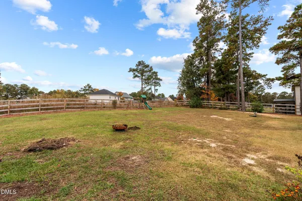 a view of an ocean and a yard
