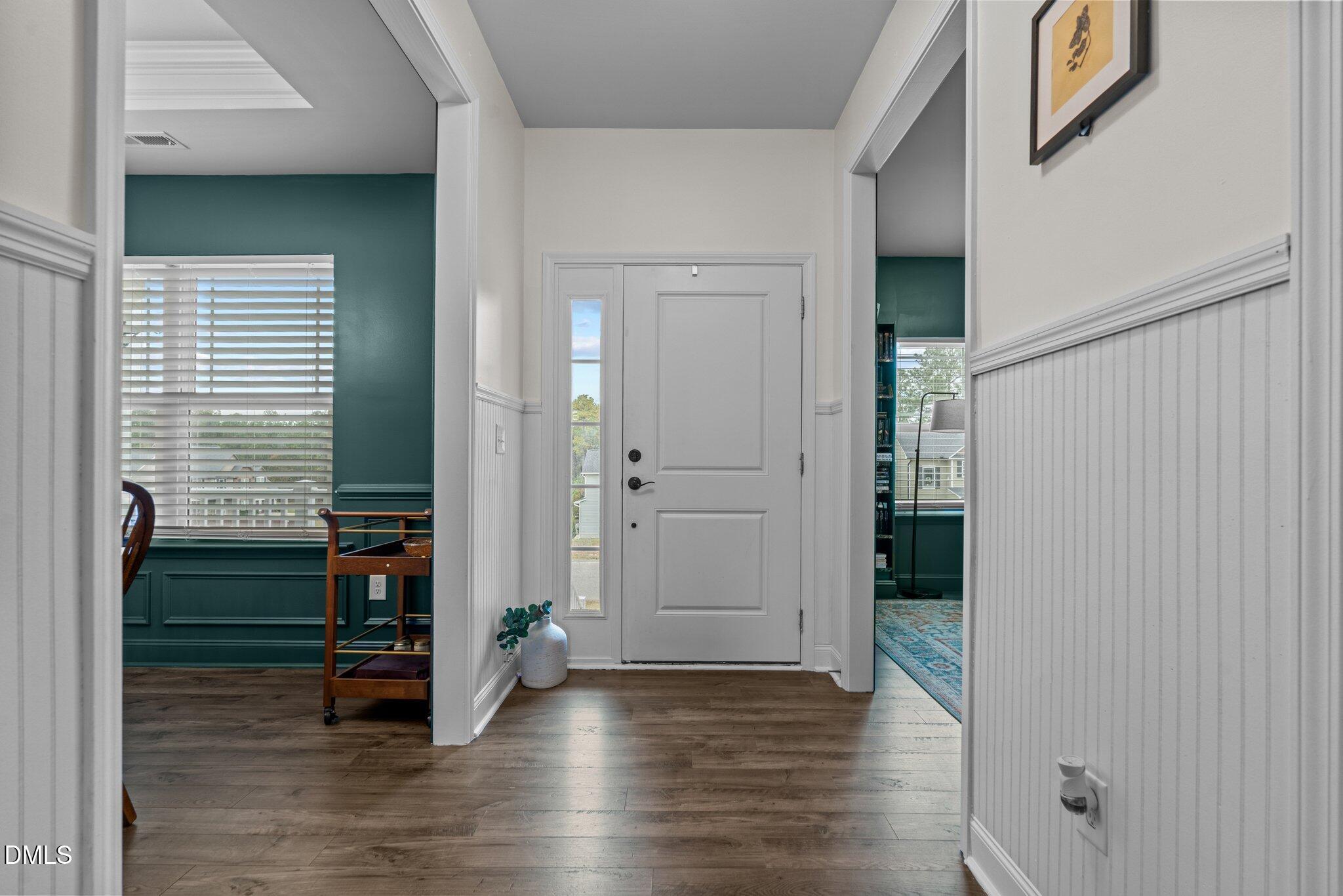 111 Spring Flowers Drive Cameron, NC 28326 - Photo 3 of 31 a view of an entryway with wooden floor