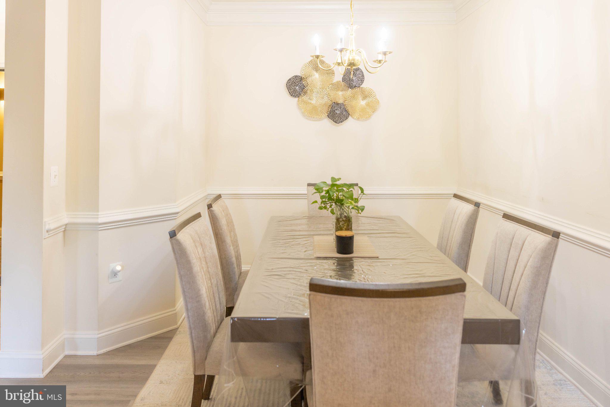 12824 Clarksburg Square Road, Unit 105 Clarksburg, MD 20871 - Photo 52 of 96 Elegant dining space with modern charm.
