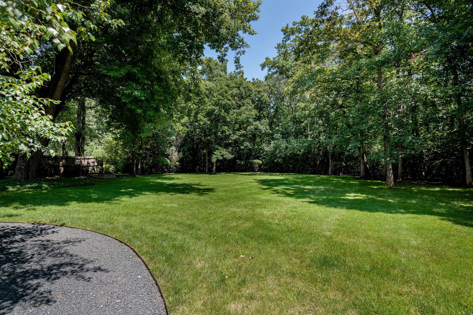 559 Rockefeller Road Lake Forest, IL 60045 - Photo 42 of 50 a view of a park with trees in the background
