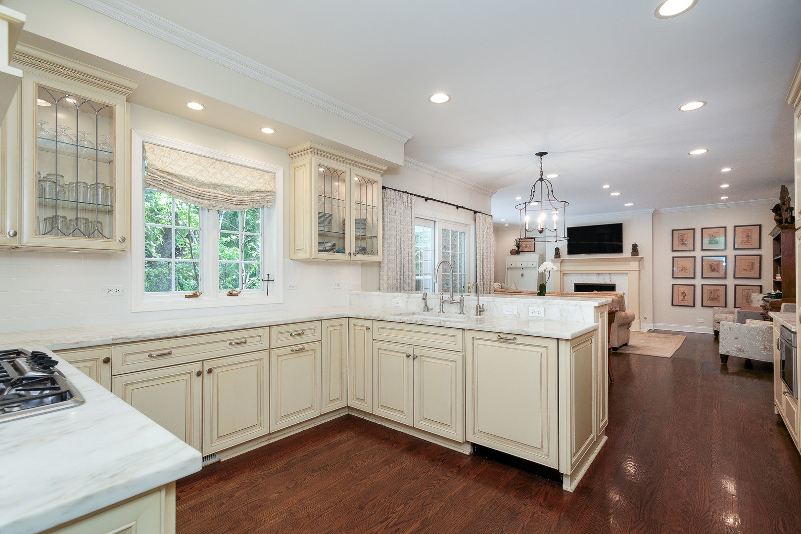559 Rockefeller Road Lake Forest, IL 60045 - Photo 5 of 50 a kitchen with sink cabinets and wooden floor