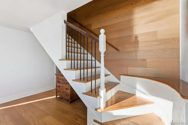 a view of entryway with wooden floor