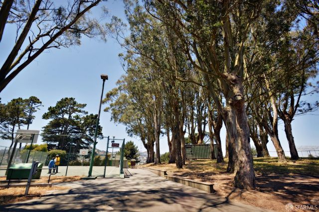 a view of a brick house with a large mirror on the wall