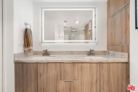 a bathroom with a shower and toilet