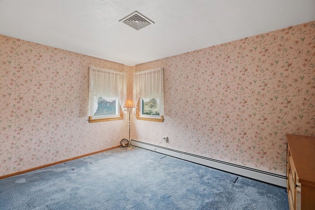 10 Deluca Road Milford, MA 01757 - Photo 29 of 37 a view of an empty room with a window