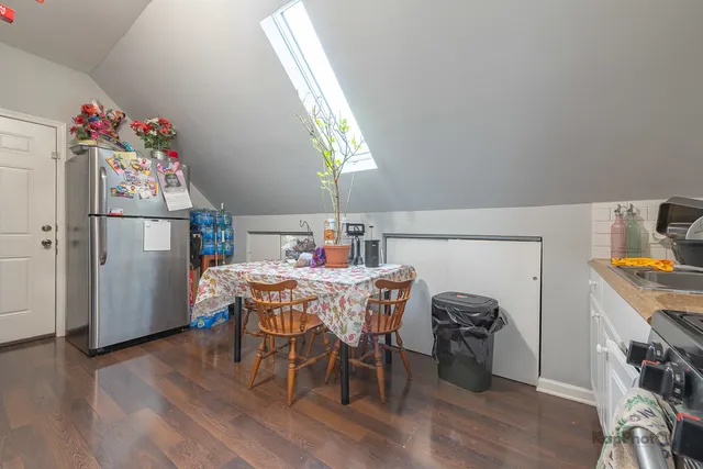 a room with furniture and wooden floor