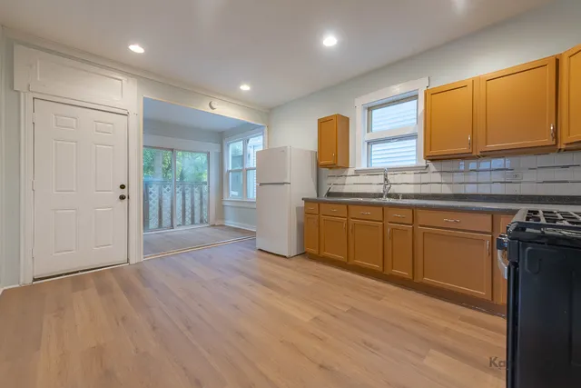 a living room with a couch and a window