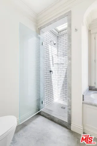 a bathroom with a sink and a shower