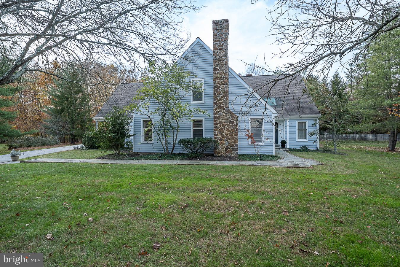 403 Chester Road Devon, PA 19333 - Photo 1 of 35 Exterior Front with stone chimney