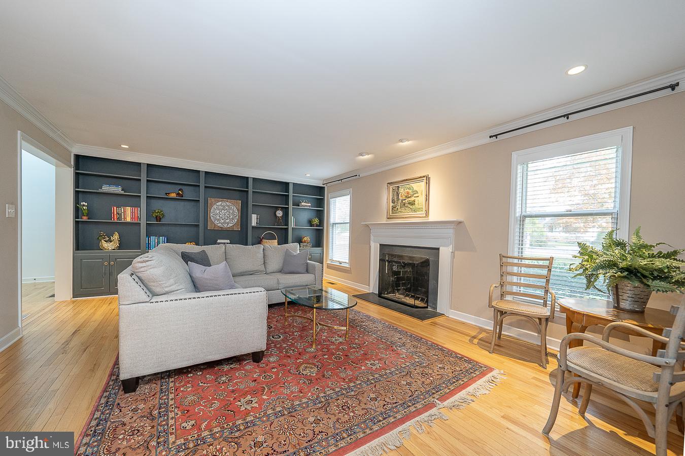 403 Chester Road Devon, PA 19333 - Photo 7 of 35 Living Room with fireplace and built ins