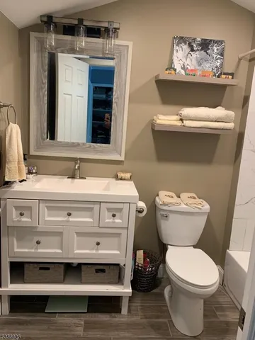 a bathroom with a sink and a toilet