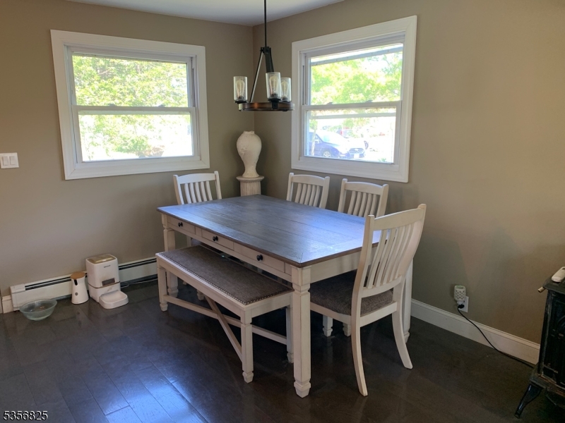 7 Shore Road Wayne, NJ 07470 - Photo 5 of 13 a view of a dining room with furniture window and wooden floor