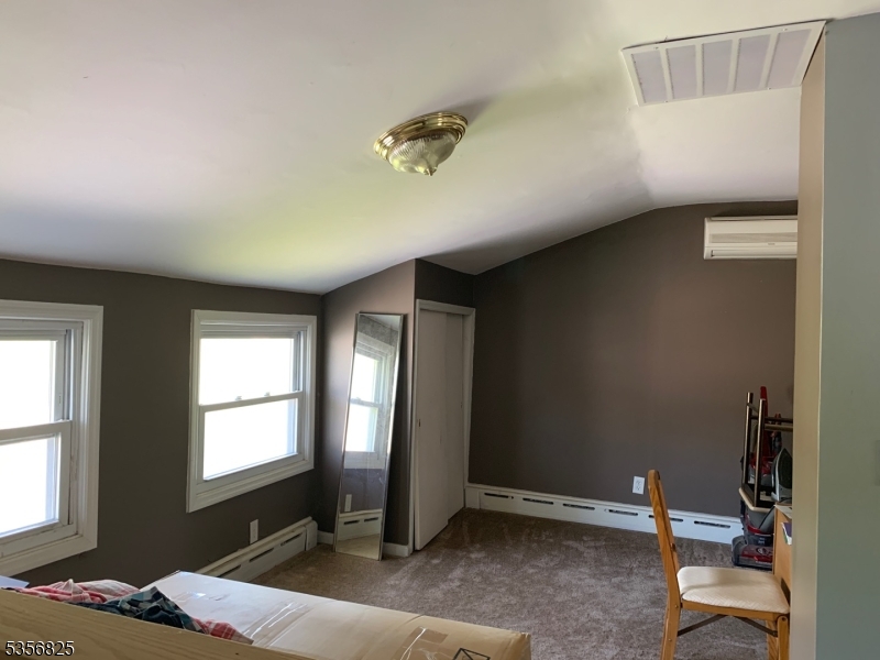 7 Shore Road Wayne, NJ 07470 - Photo 10 of 13 a bedroom with a bed and a window