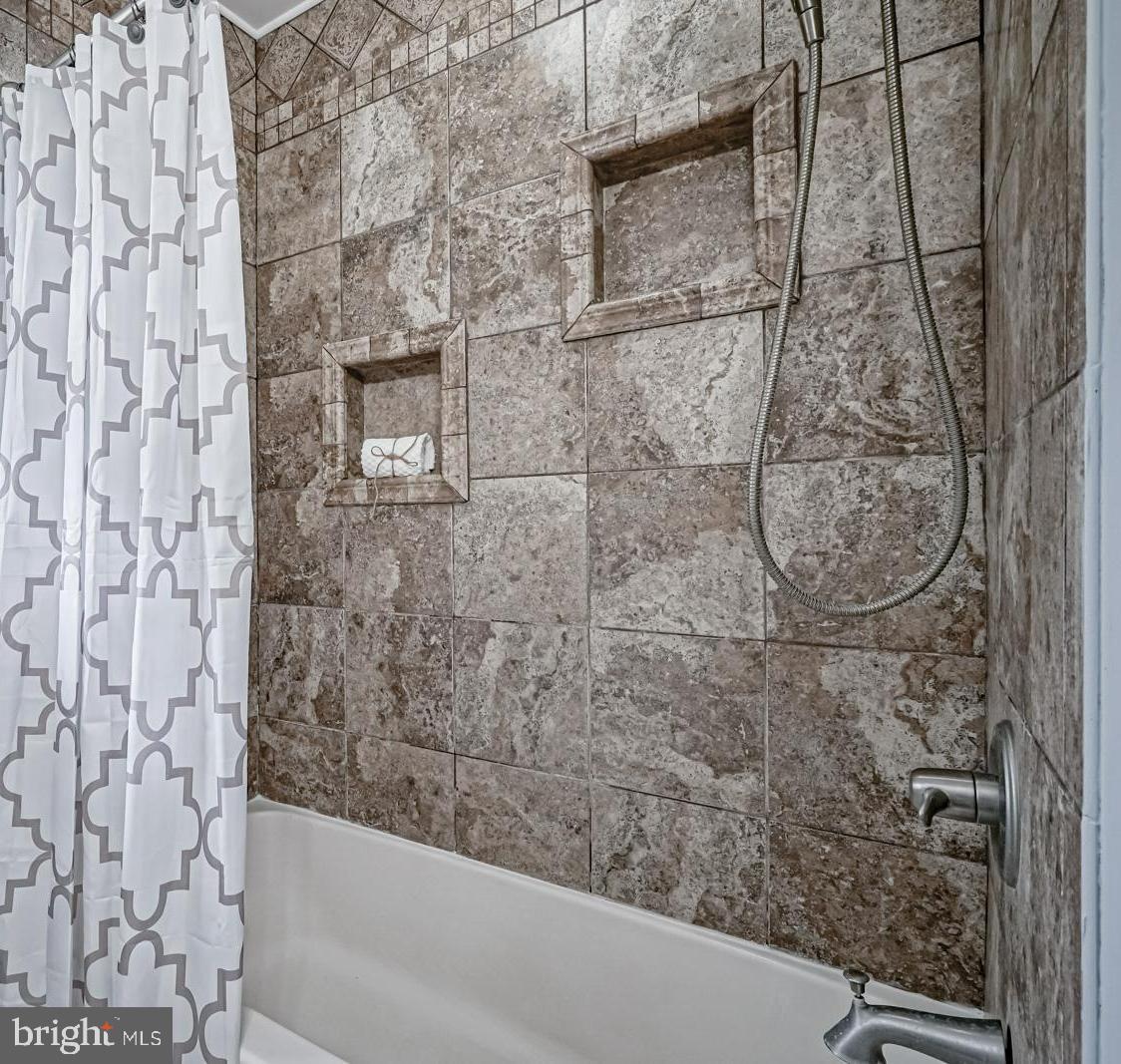 121 Eaton Road Pennsville, NJ 08070 - Photo 23 of 36 Tiled shower in the full bath