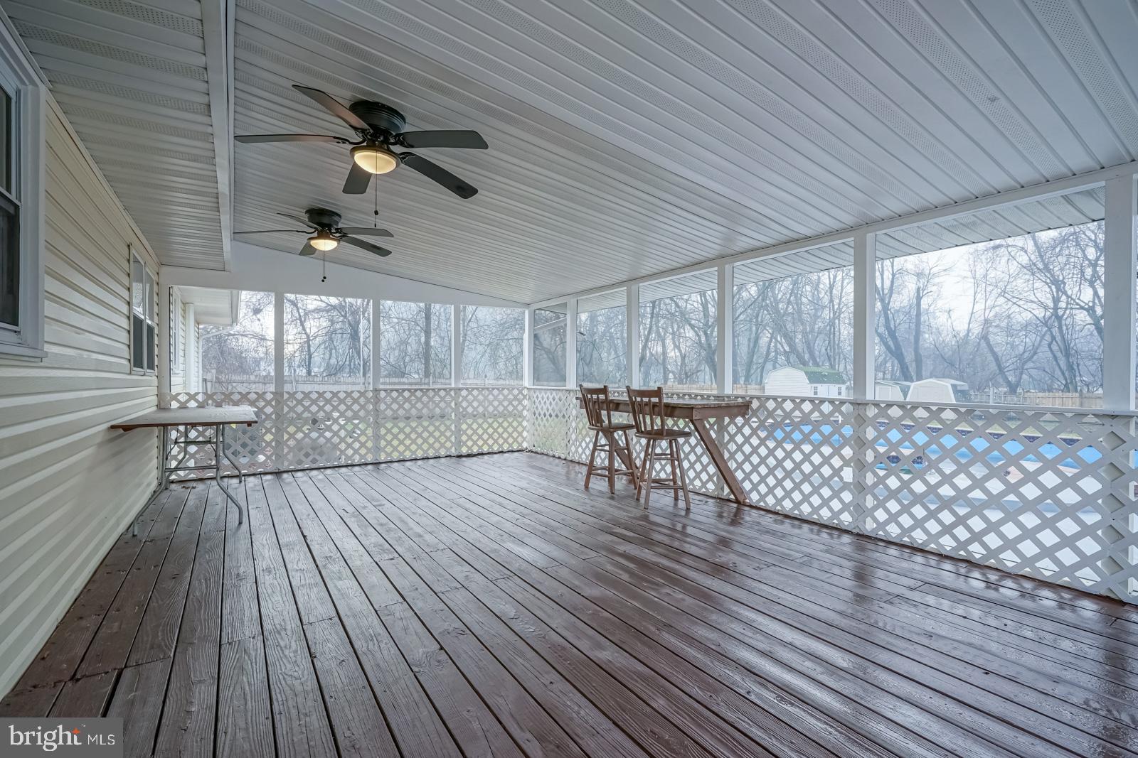 121 Eaton Road Pennsville, NJ 08070 - Photo 24 of 36 Covered and screened in back porch