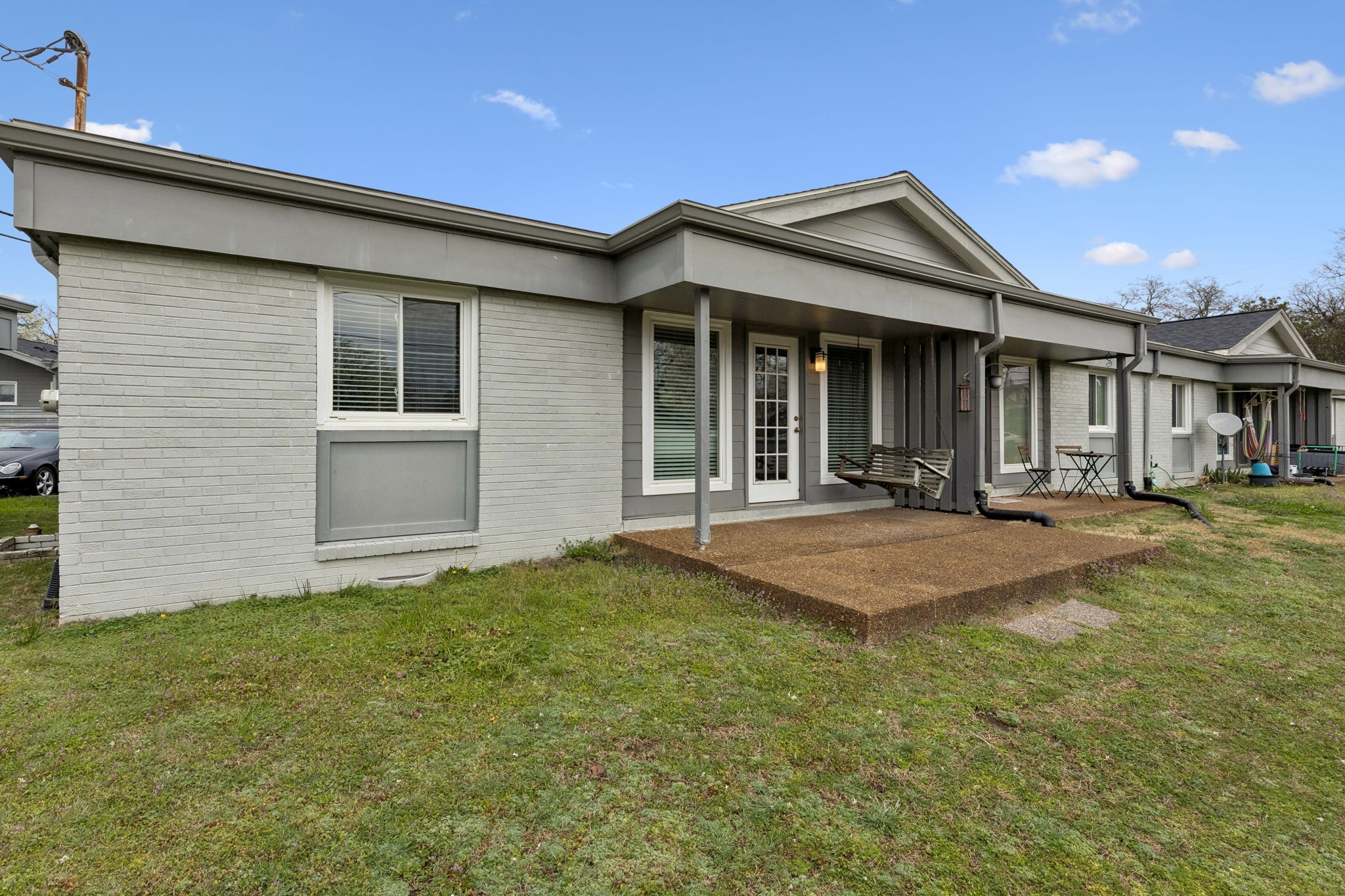 1900 Richard Jones Road, Unit M4 Nashville, TN 37215 - Photo 13 of 16 a front view of a house with a yard