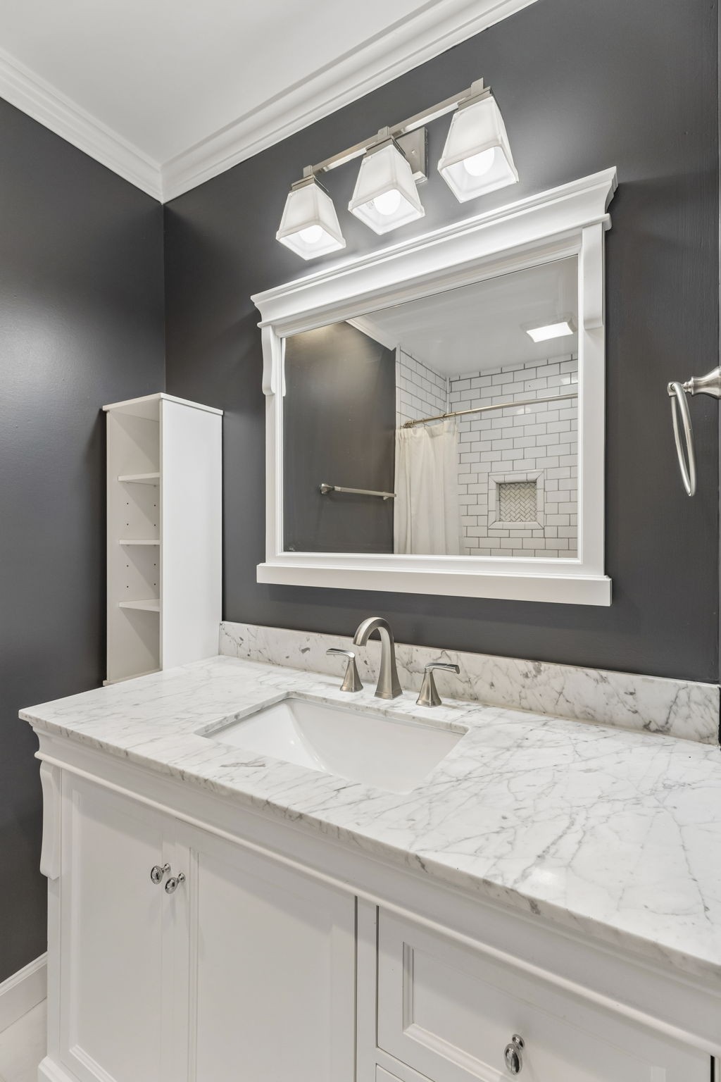 1900 Richard Jones Road, Unit M4 Nashville, TN 37215 - Photo 8 of 16 a bathroom with a sink and a mirror