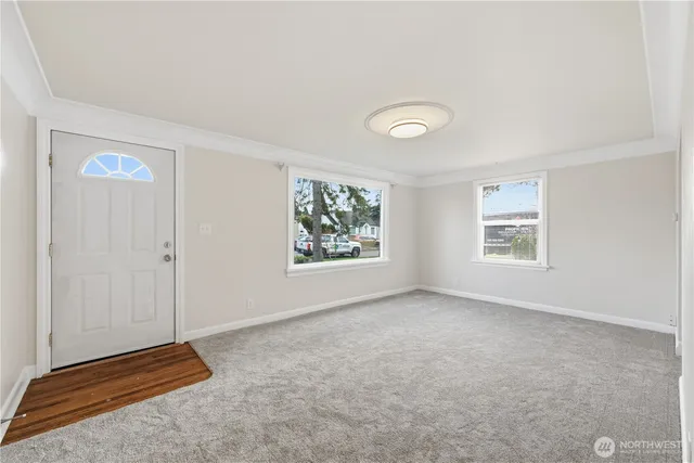 an empty room with windows